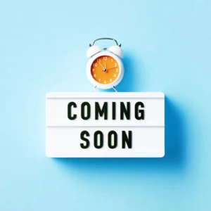 Coming soon sign with orange alarm clock